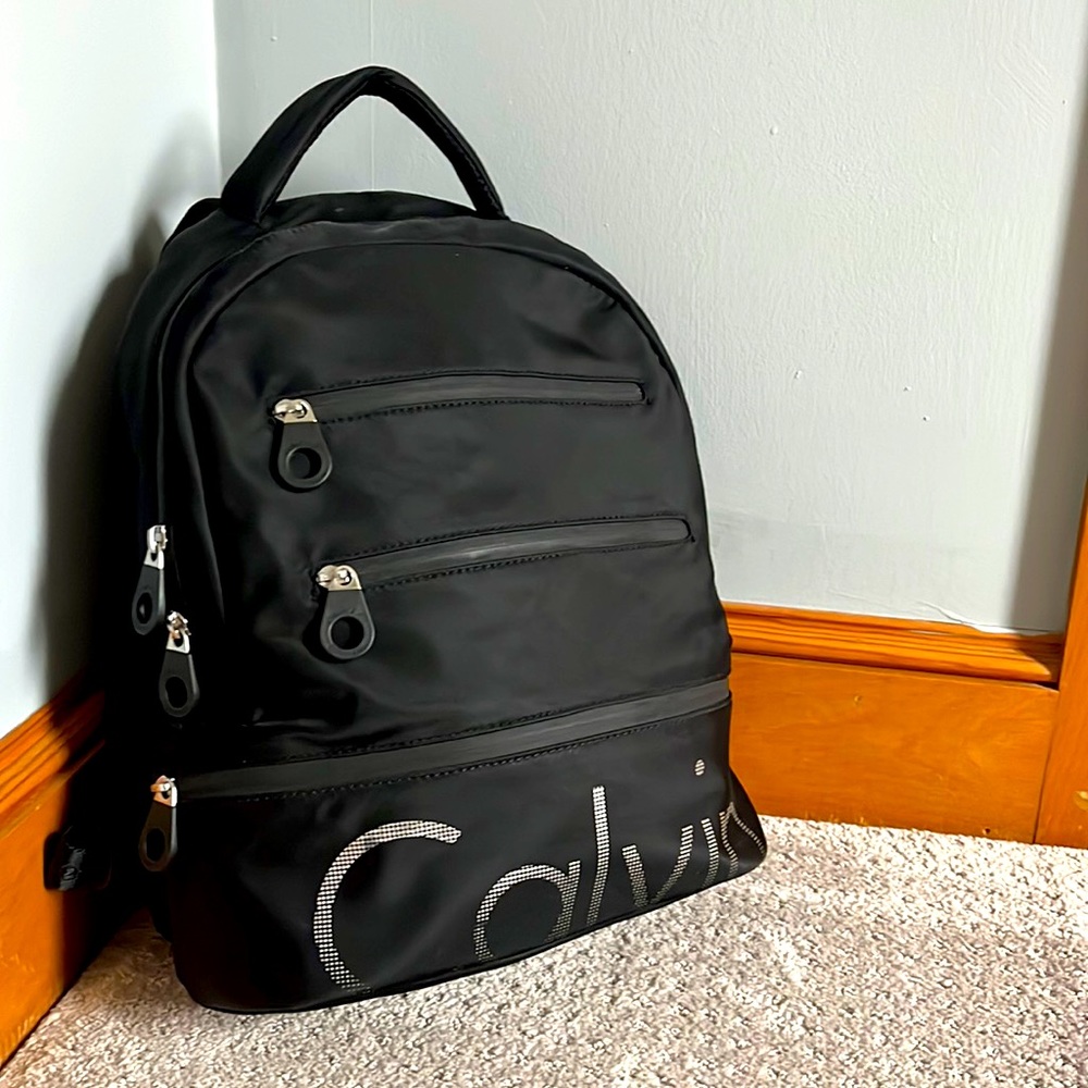 Black nylon, water resistant backpack. Medium.